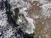 Heavy precipitation, record warmth - Visible satellite imagery of California after the passage of the powerful winter storms showing a deep snow pack in the Sierra Nevada and lush green vegetation at lower elevations